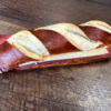 Laugenstange gefüllt mit Mostbröckli/Parmesan