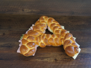 Butterzopf-Buchstaben gefüllt